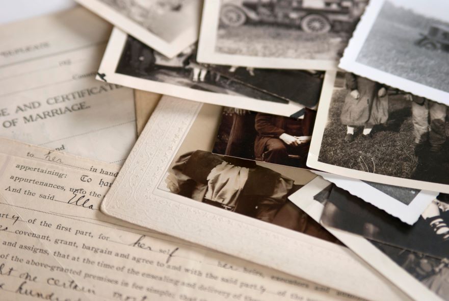 old letters and a bunch of old looking photos