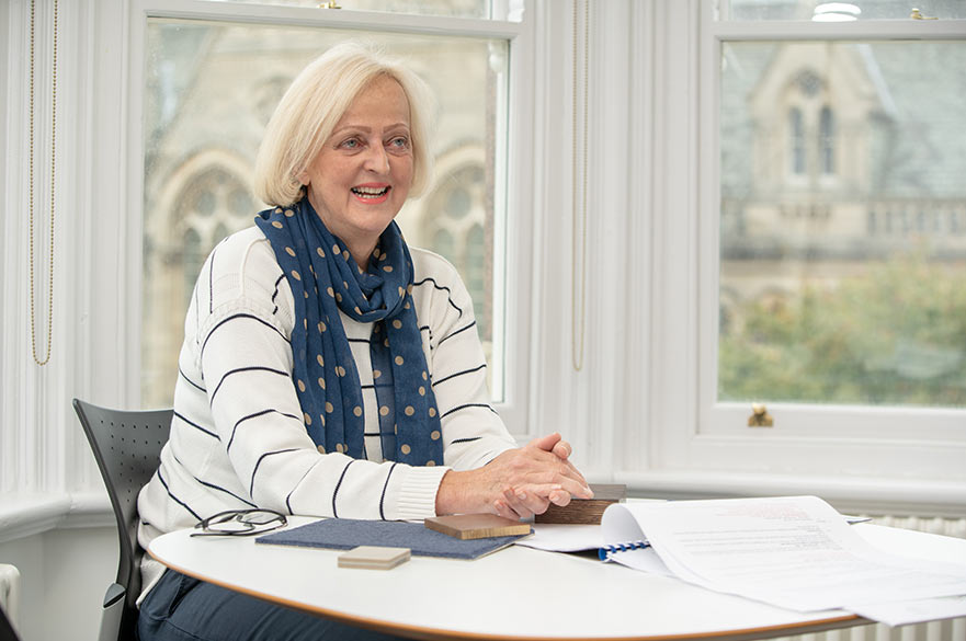 Michelle Pepin sitting at desk