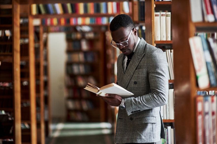 Male Lawyer Looking at Book