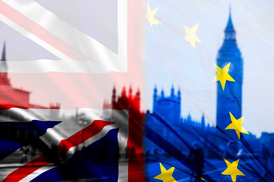 Union Jack and EU flag over Houses of Parliament