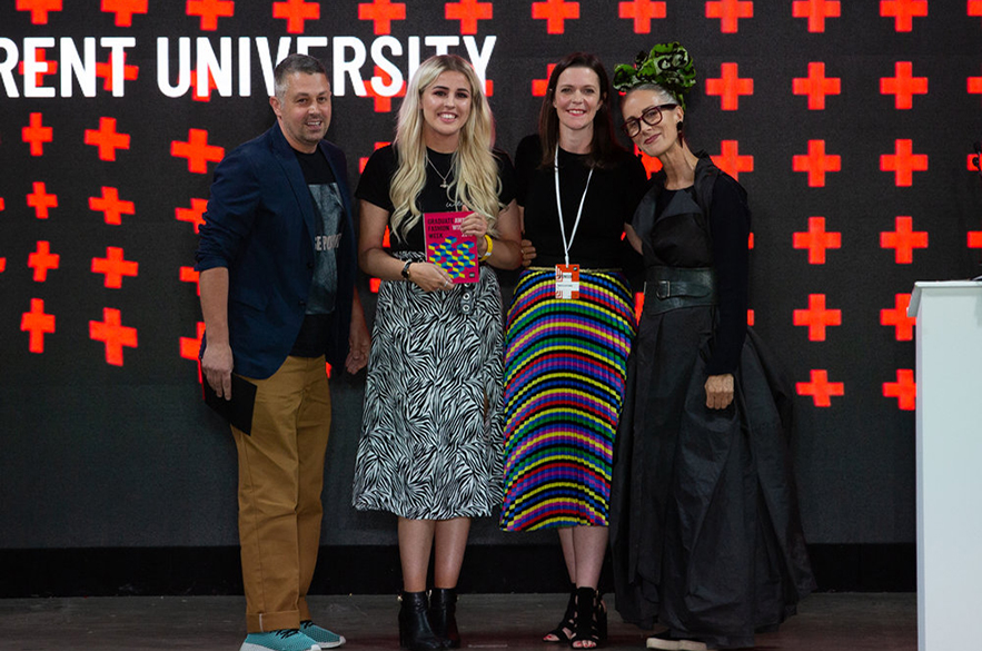 People holding an award