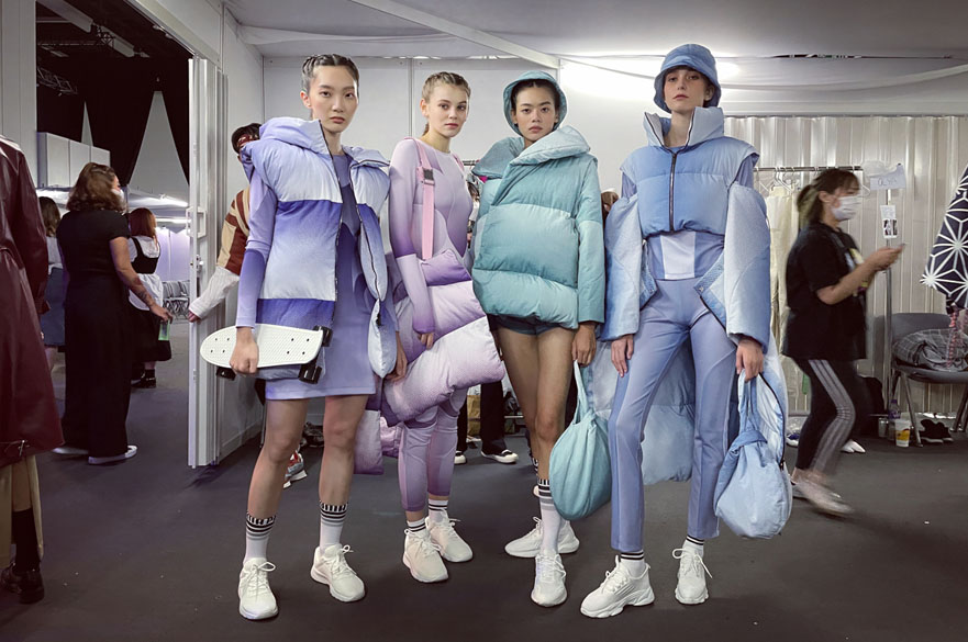 Women wearing fashion designs 