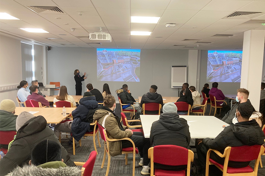 Students listening to the project briefing