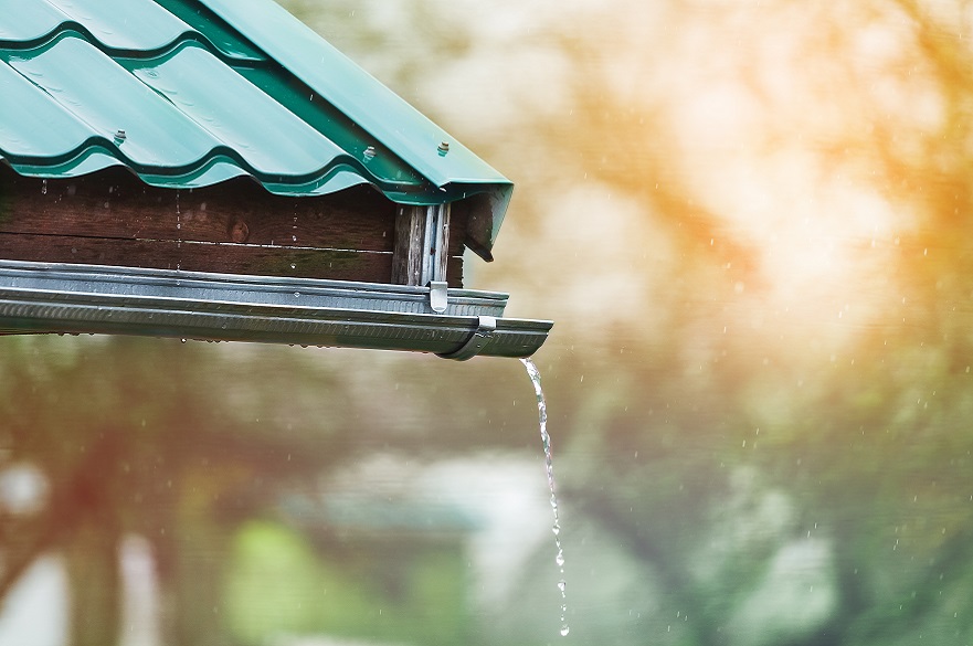rain pouring off gutter