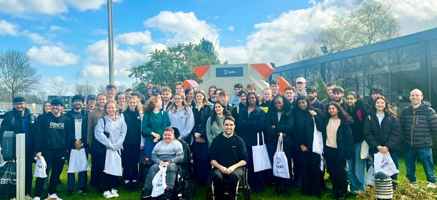 BSc Product Design students posing outside of a factory