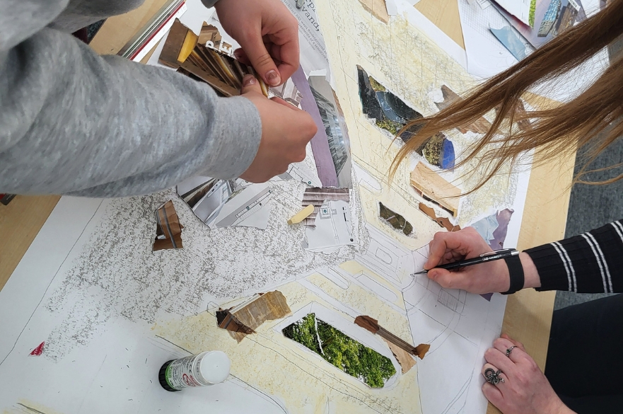 Architecture students working on their designs inside the studio.