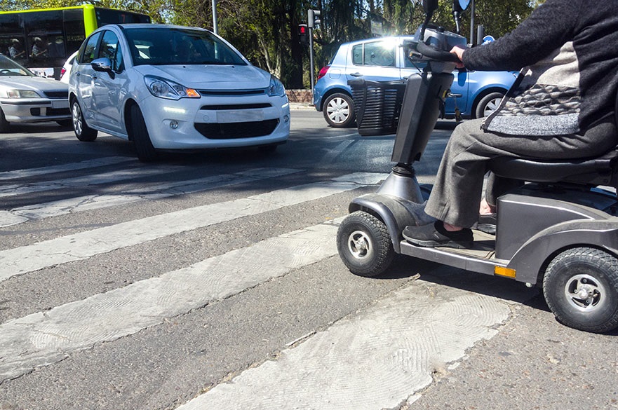 Mobility scooter at a zebra crossing