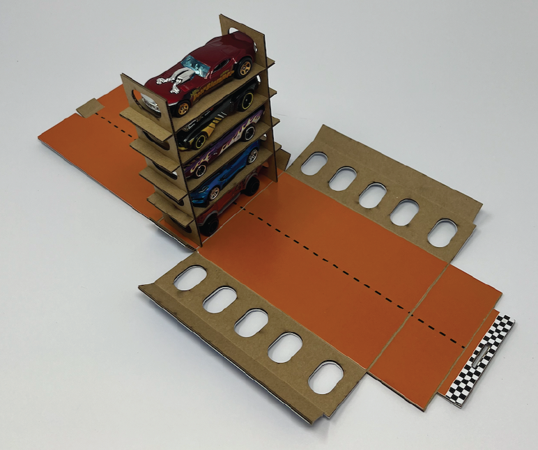 Toy car packaging made out of cardboard.