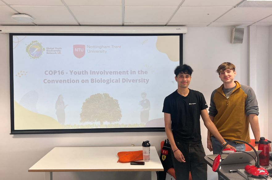 Harsh Sagar, NLS student and Josh Shaw, ARES student with their presentation for COP16