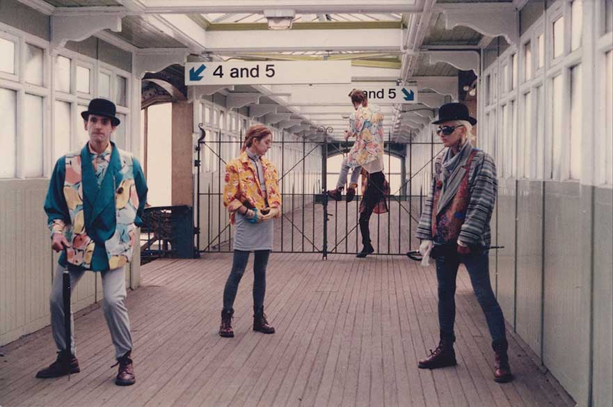 Figures in 1980s fashion at Nottingham Train station