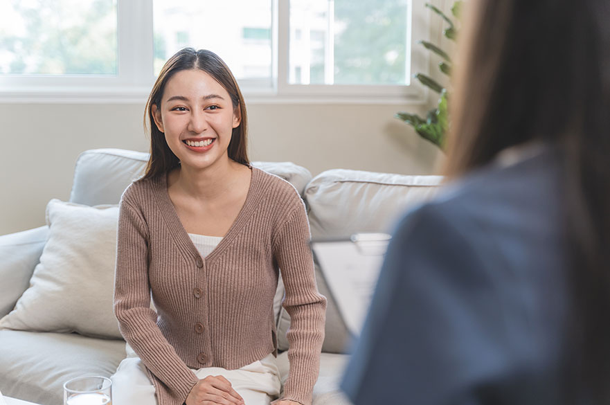 Young girl talking to a counsellor