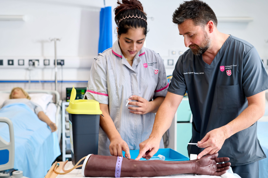 nursing student with patient