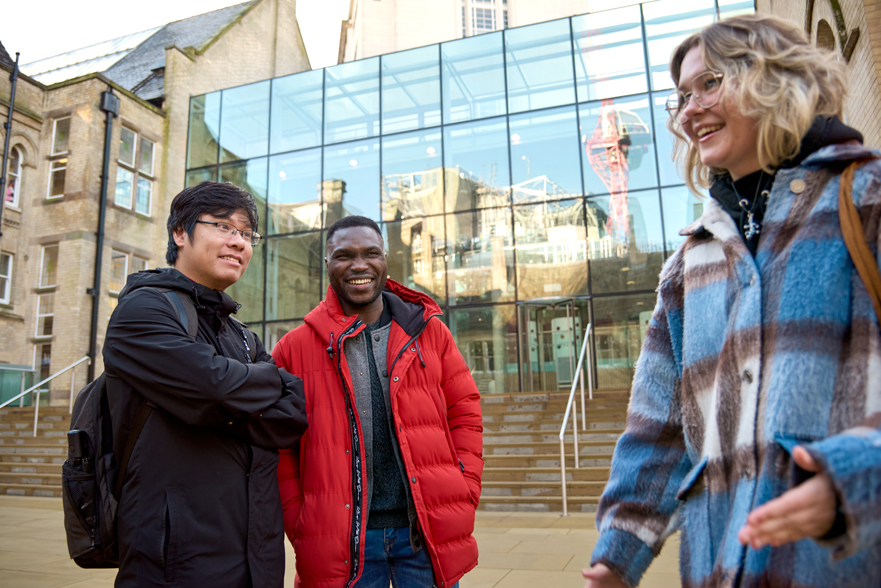 Students walking and smiling in Arkwright