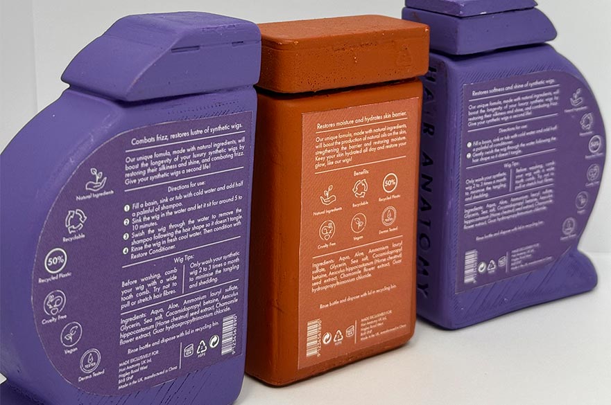 The back of a shampoo and conditioner bottle listing all of its incredients