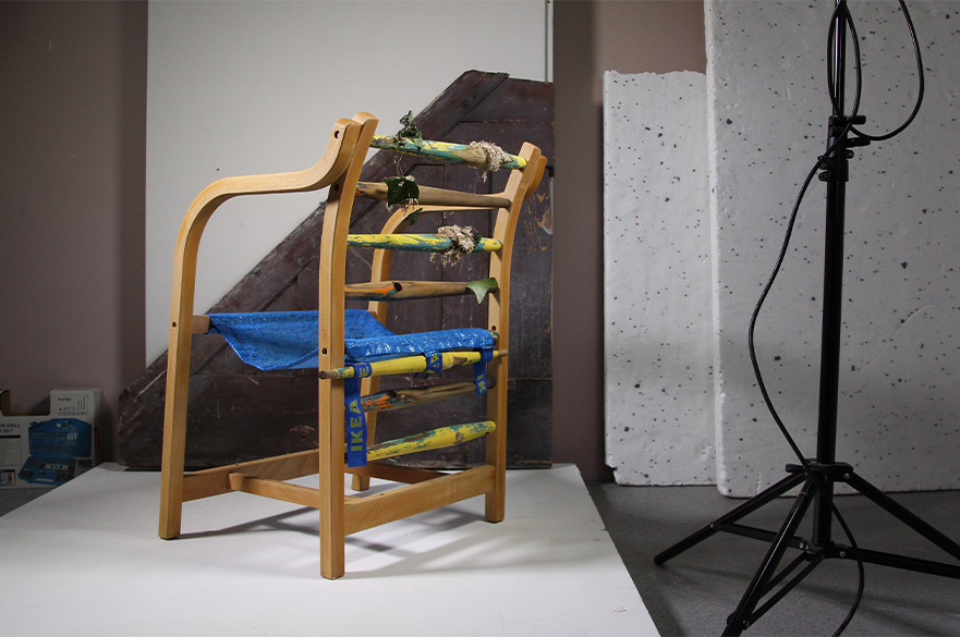 Picture of a wooden chair made out of recycled materials
