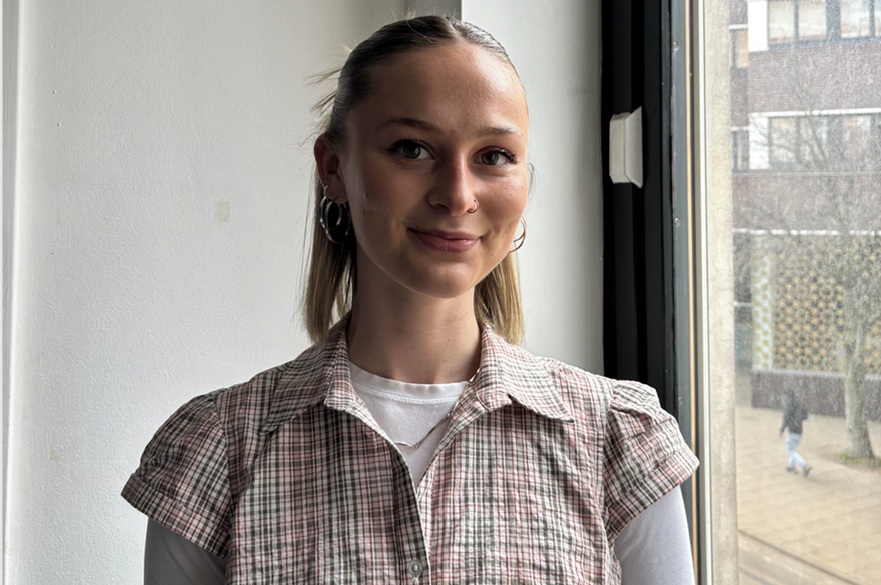 A person smiling for the camera.
