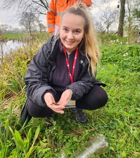 Image of Biodiversity Conservation alumni Jemma Maguire holding a newt.