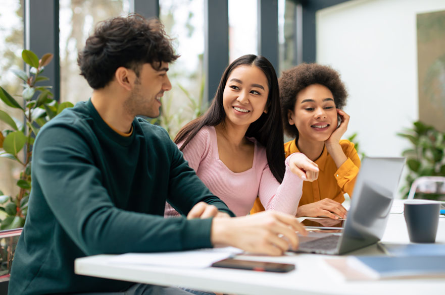 Student marketers around a table