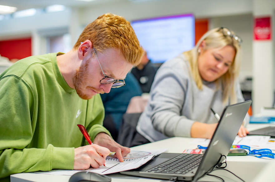 MBA students working in class