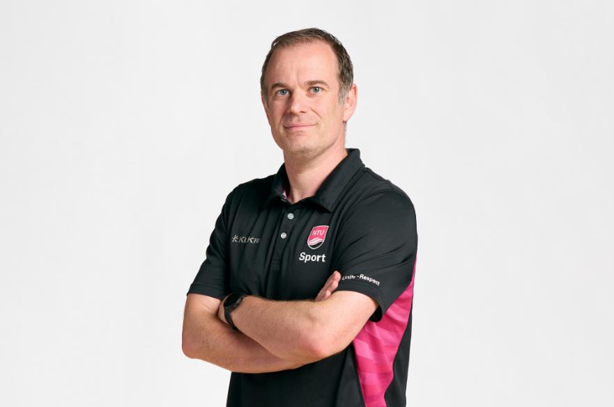 NTU Sport's Head of Football posed in front of a white background