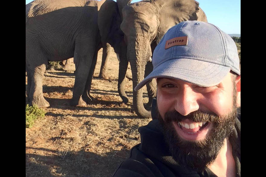Staff member with elephants