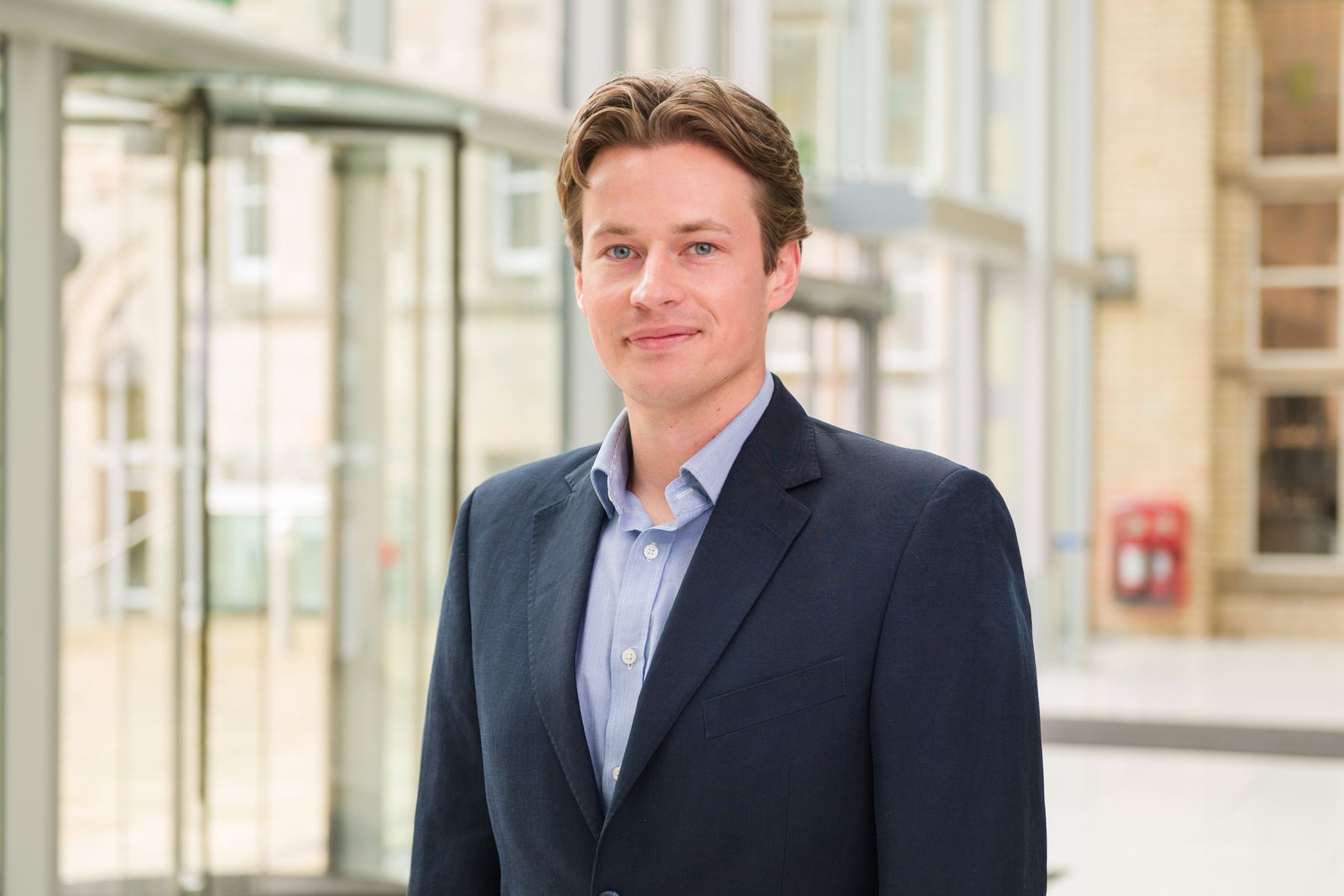 Professional headshot of Lecturer Adam Harris