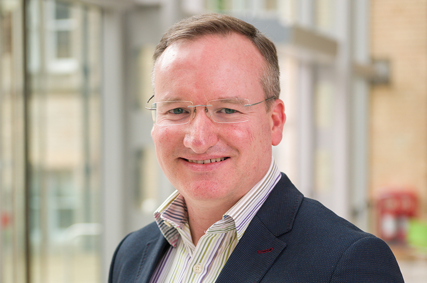 Professional headshot of Senior Lecturer Iain Emerson