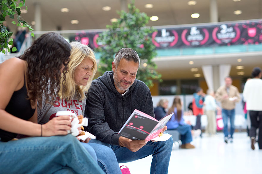 Family with prospective student exploring out study guide