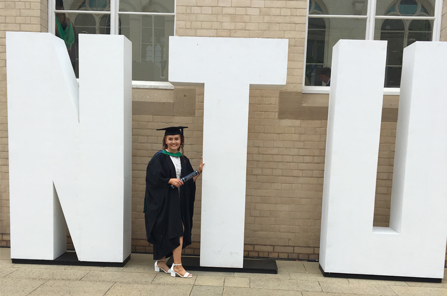 Student with NTU sign