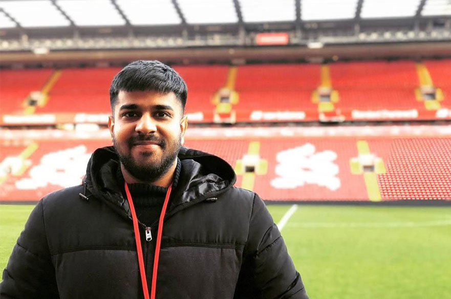 Madhav Ahuja with a football pitch in the background