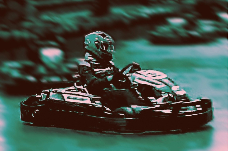 Ina in her go carting car racing on the track