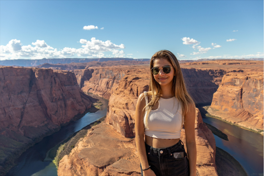Kiran Patel standing on the hill with Grand Canyon in the background 