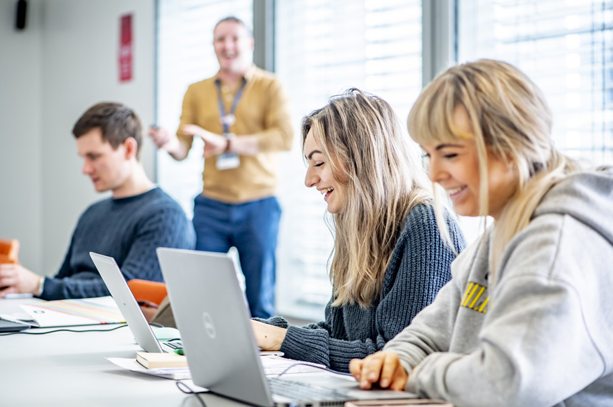 Students working in a classroom.