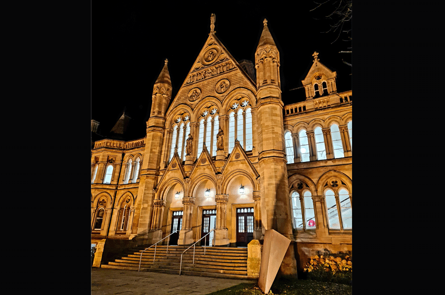 Arkwright building lit up in orange