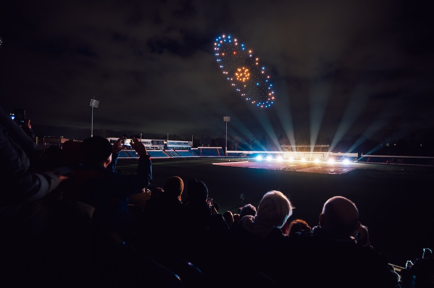 Audience watching a drone light display