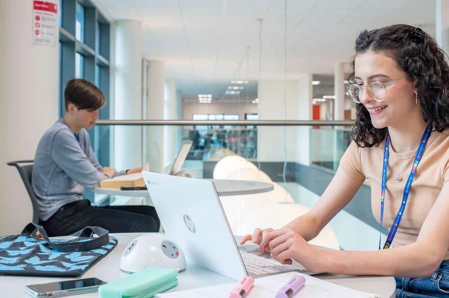 A student studies in the library