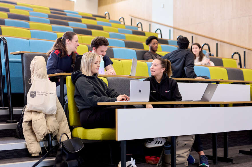 Students sitting in a lecture theatre